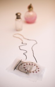 fabric pendent and perfume bottles